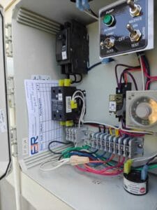 Maintanance on septic control panel done by FJR Septic Installers in San Antonio Texas