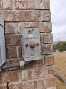 Fjr Septic Installers doing Maintenance on a Septic system control panel