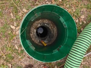 FJR Septic Installers Checking water level in a service call in canyon lake